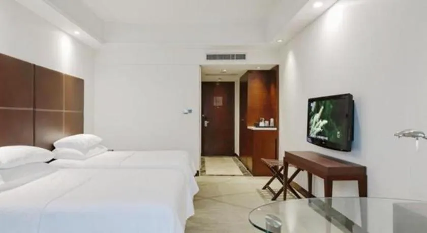 Bed in New Century Grand Hotel Zhuji Yaojiang