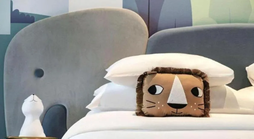 Bed in New Century Grand Hotel Zhuji Yaojiang