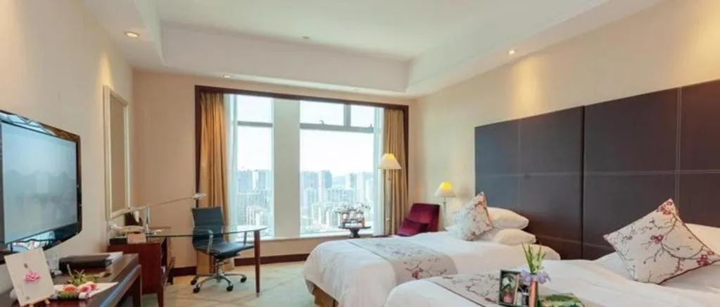 Bed in New Century Grand Hotel Zhuji Yaojiang