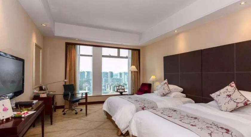 Bed in New Century Grand Hotel Zhuji Yaojiang