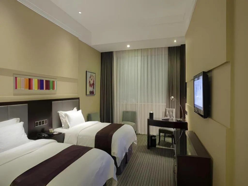 Bed in New Century Manju Hotel Shanghai New International Expo Center