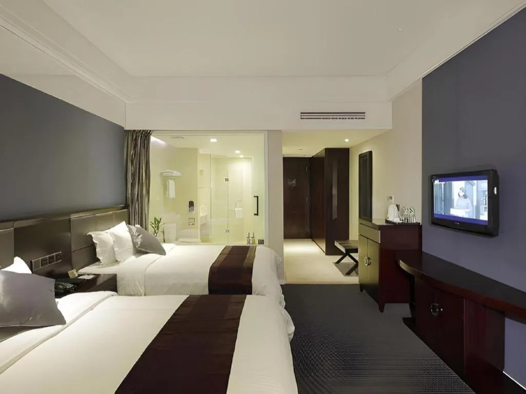 Bed in New Century Manju Hotel Shanghai New International Expo Center