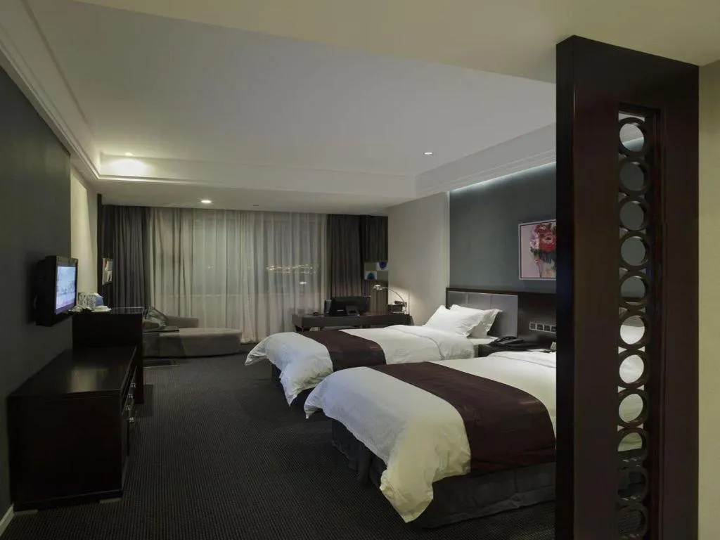 Bed in New Century Manju Hotel Shanghai New International Expo Center