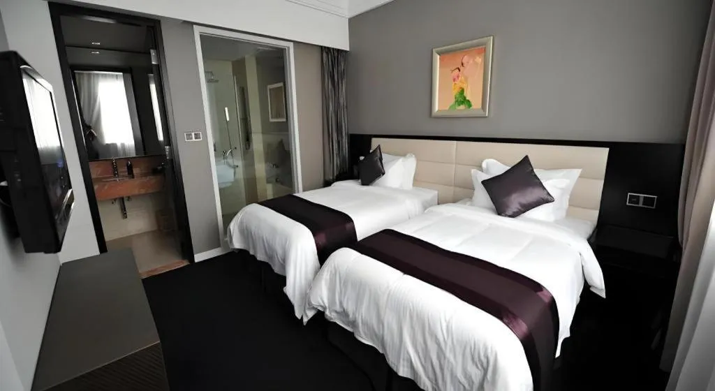 Bed in New Century Manju Hotel Shanghai New International Expo Center