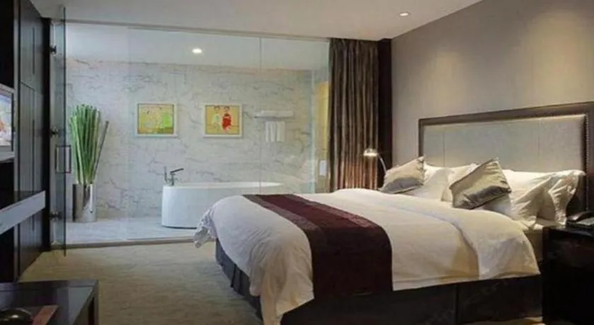 Bed in New Century Manju Hotel Shanghai New International Expo Center