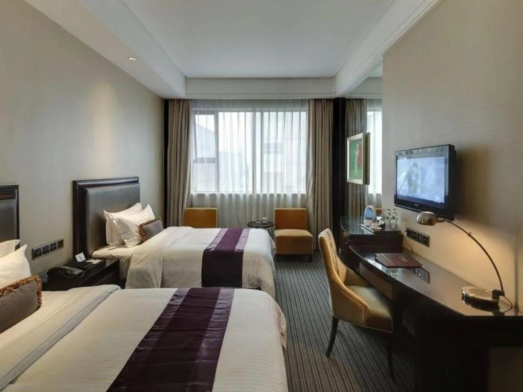 Bed in New Century Manju Hotel Shanghai New International Expo Center