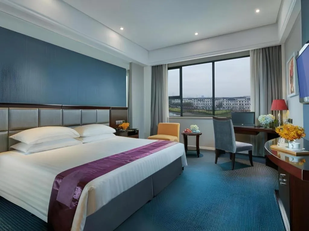 Bed in New Century Manju Hotel Shanghai New International Expo Center
