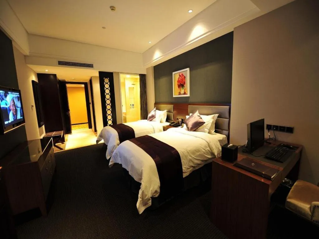 Bed in New Century Manju Hotel Shanghai New International Expo Center