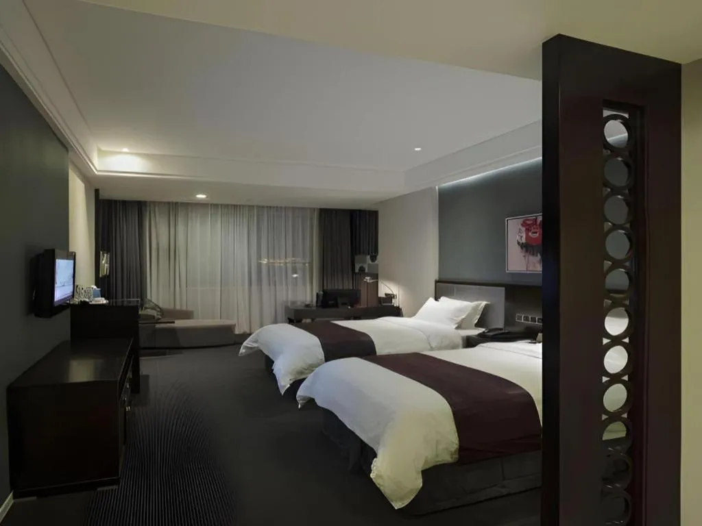 Bed in New Century Manju Hotel Shanghai New International Expo Center