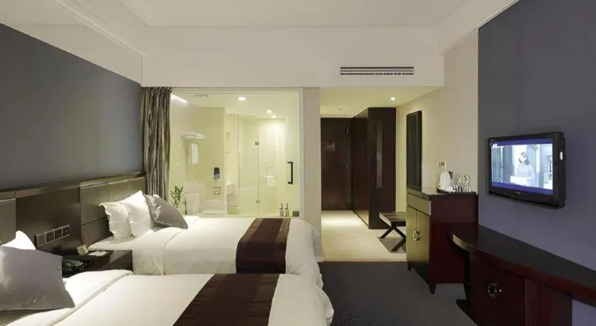 Bed in New Century Manju Hotel Shanghai New International Expo Center