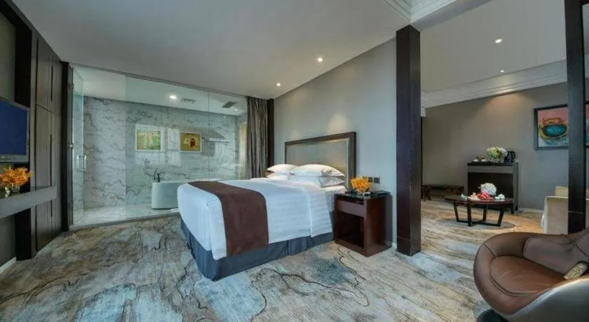 Bed in New Century Manju Hotel Shanghai New International Expo Center