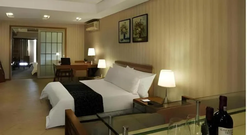 Bed in South China Laguna Hotel