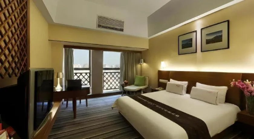 Bed in South China Laguna Hotel