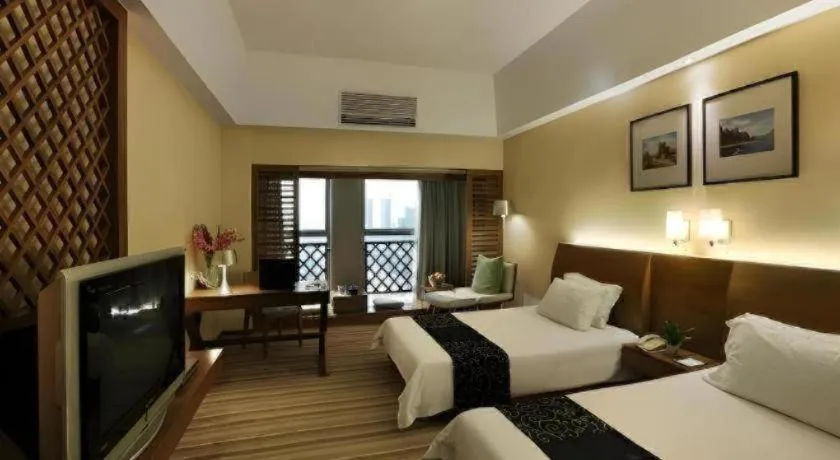 Bed in South China Laguna Hotel