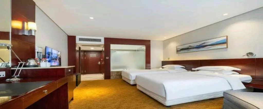 Bed in New Century Hotel Nanjing