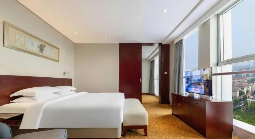 Bed in New Century Hotel Nanjing