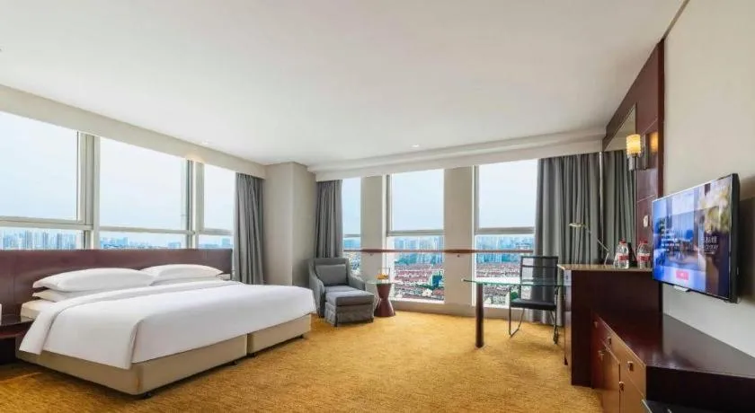 Bed in New Century Hotel Nanjing