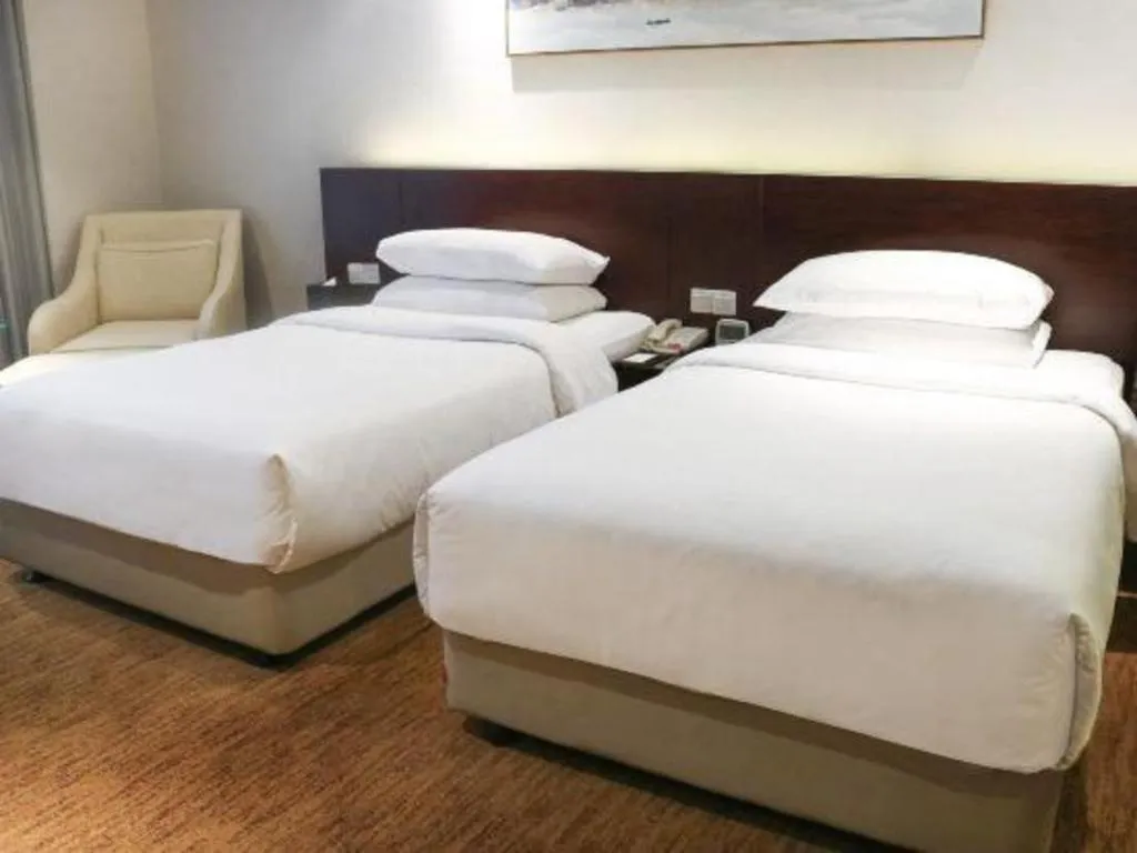 Bed in New Century Hotel Nanjing