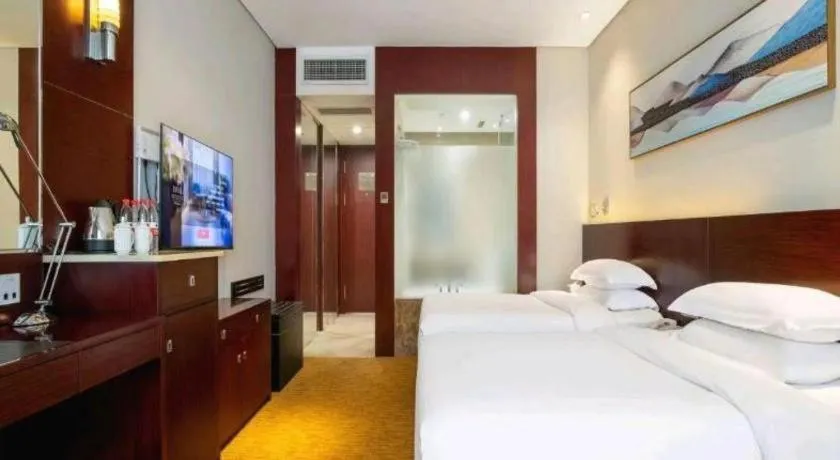 Bed in New Century Hotel Nanjing