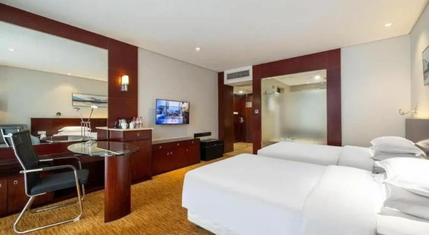 Bed in New Century Hotel Nanjing
