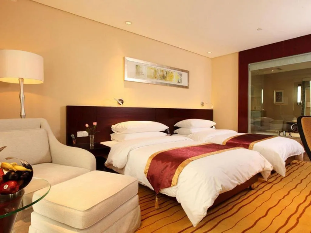 Bed in New Century Hotel Nanjing