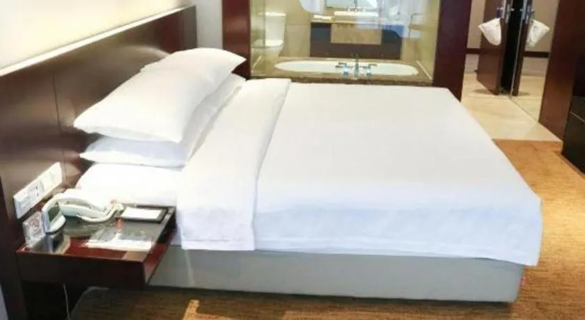 Bed in New Century Hotel Nanjing