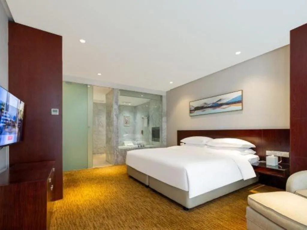 Bed in New Century Hotel Nanjing