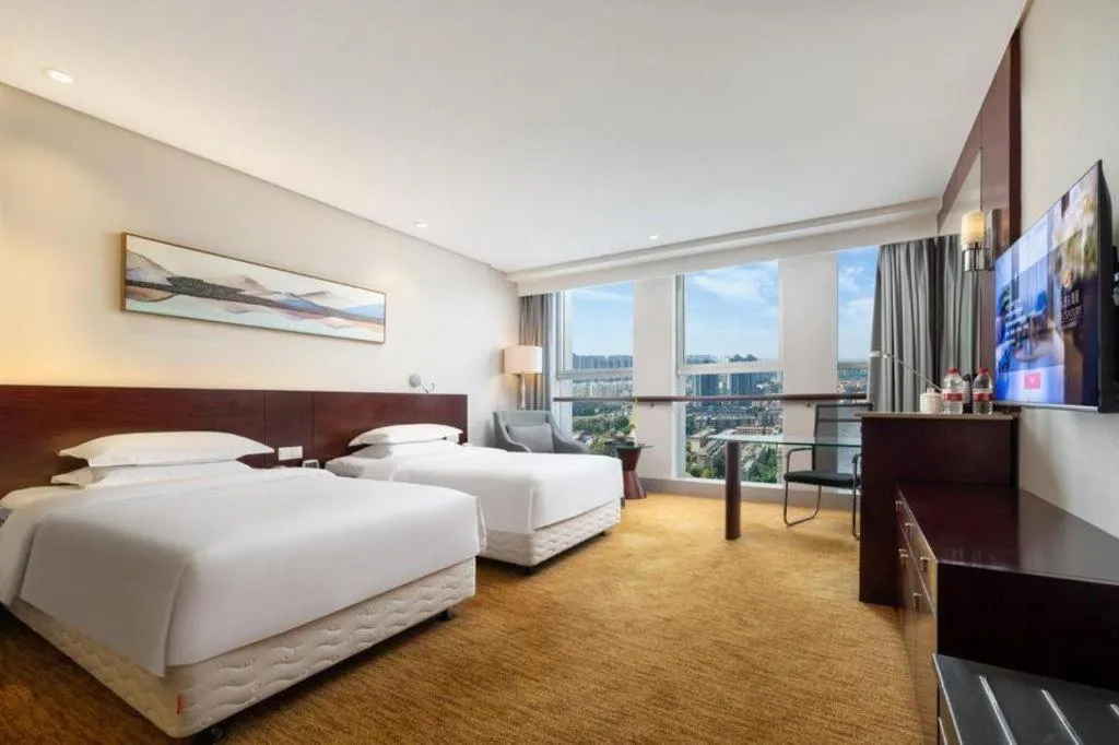 Bed in New Century Hotel Nanjing