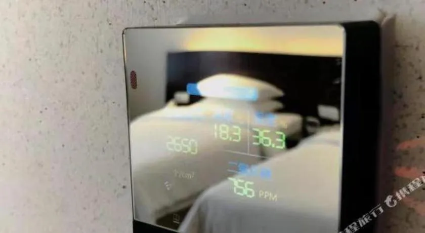 Bed in New Century Hotel Nanjing