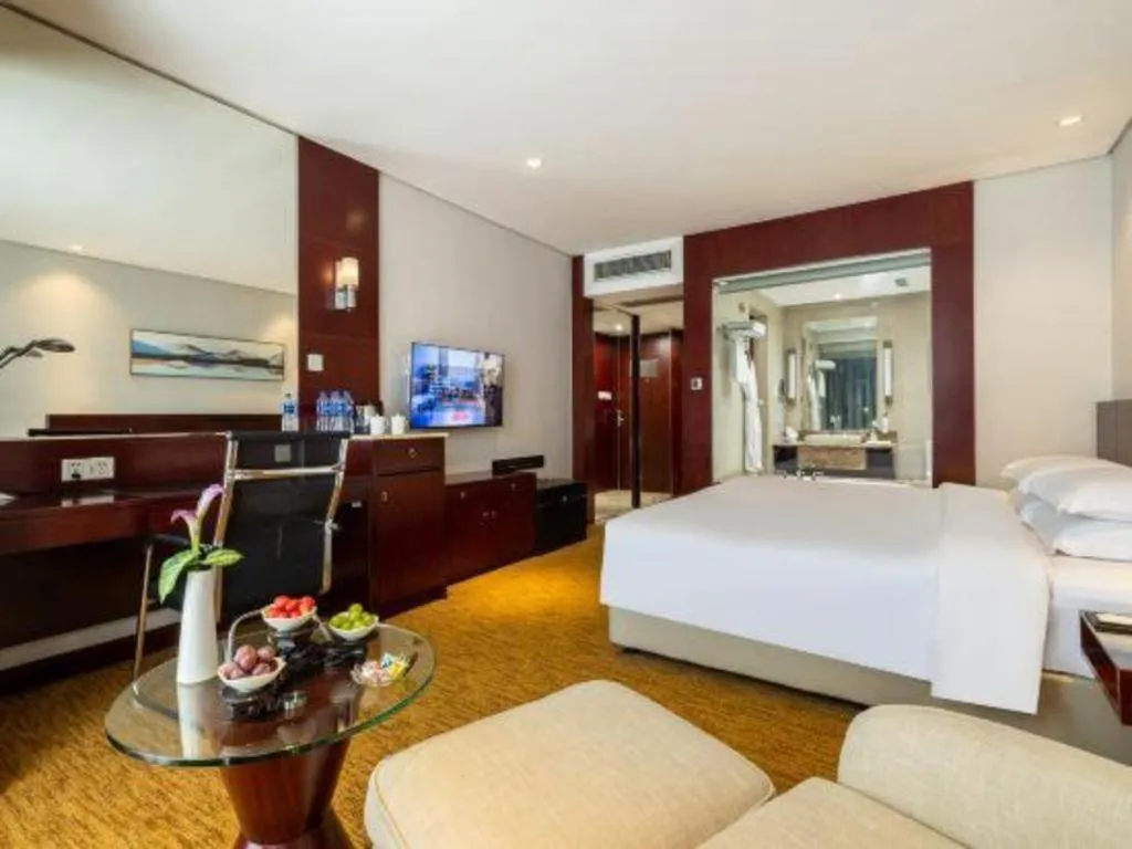 Bed in New Century Hotel Nanjing