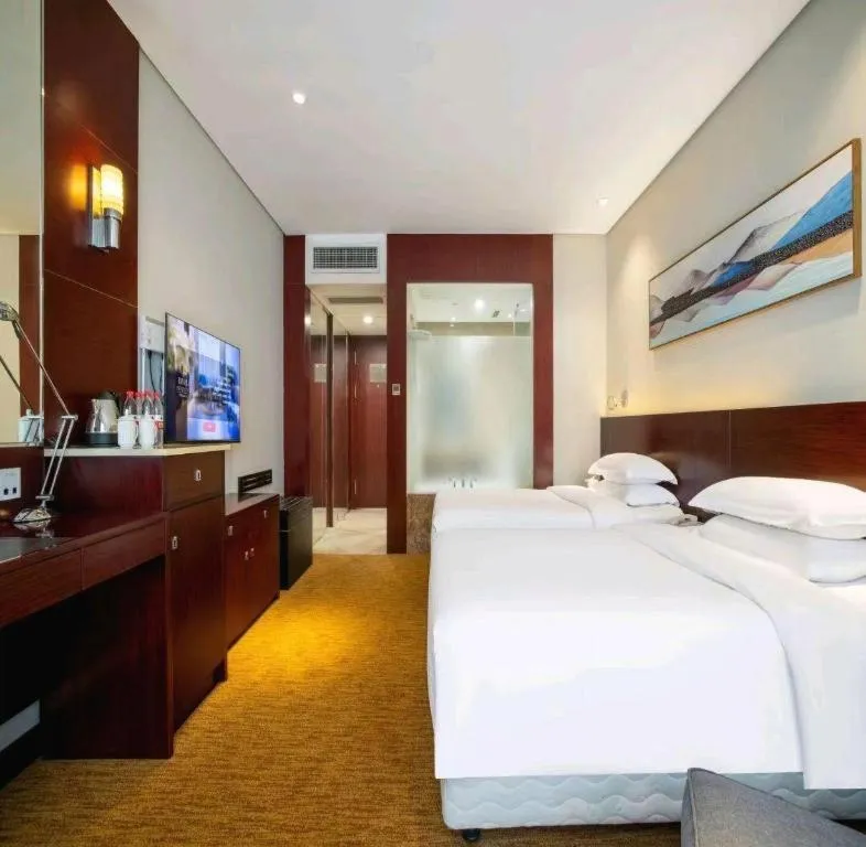 Bed in New Century Hotel Nanjing