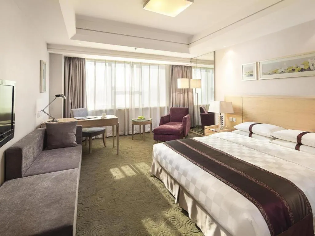 Bed in Ramada Plaza Shenyang Citycenter