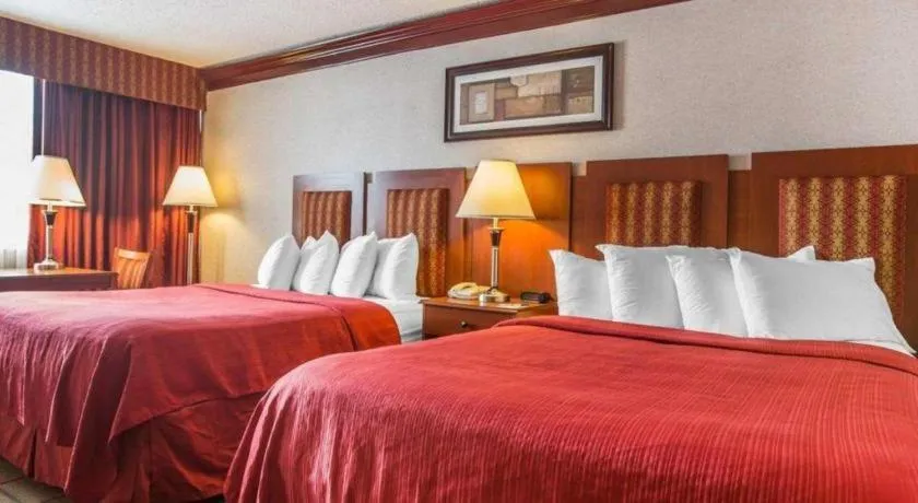 Bed in Quality Inn & Conference Center