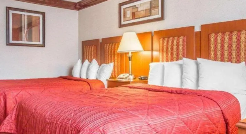 Bed in Quality Inn & Conference Center