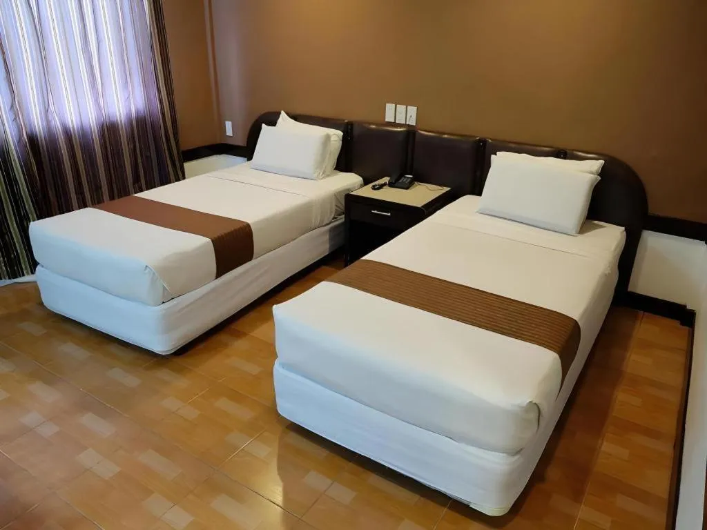 Bed in Holiday Spa Hotel