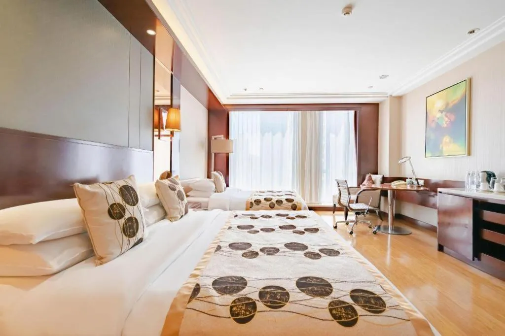 Bed in Kunming Golden Eagle Summit Hotel