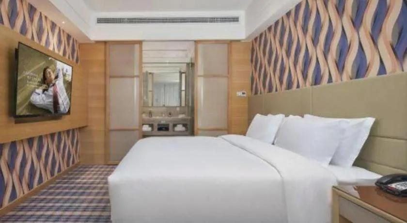 Bed in Yueyang Grand Skylight Hotel