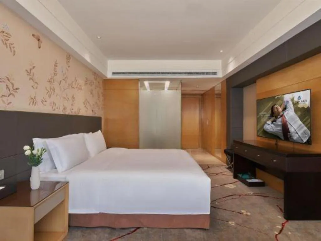 Bed in Yueyang Grand Skylight Hotel