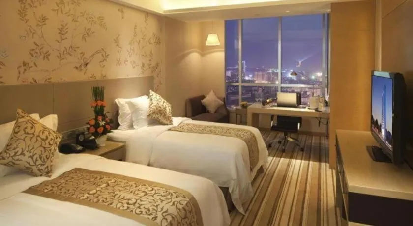 Bed in Yueyang Grand Skylight Hotel