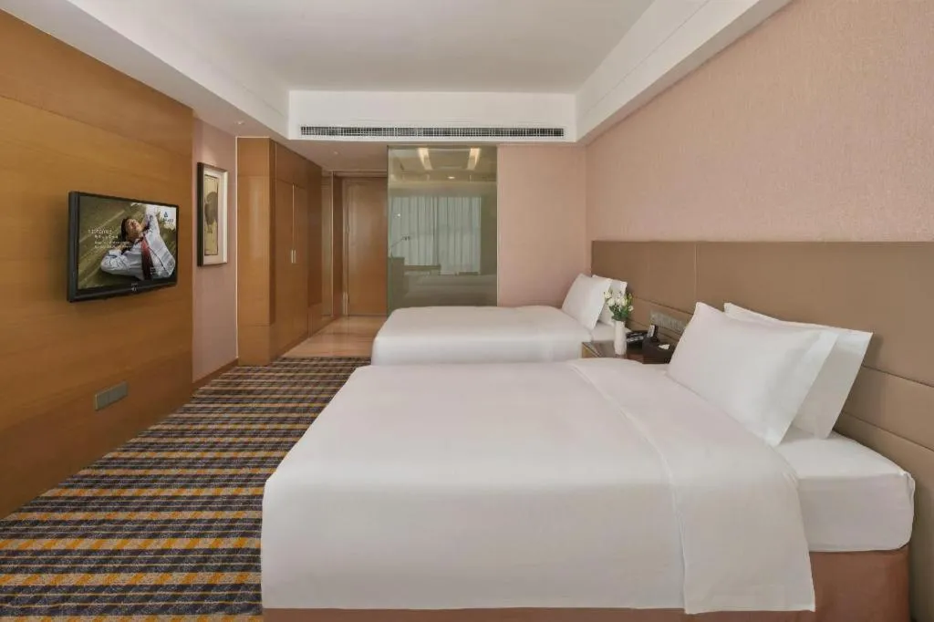 Bed in Yueyang Grand Skylight Hotel