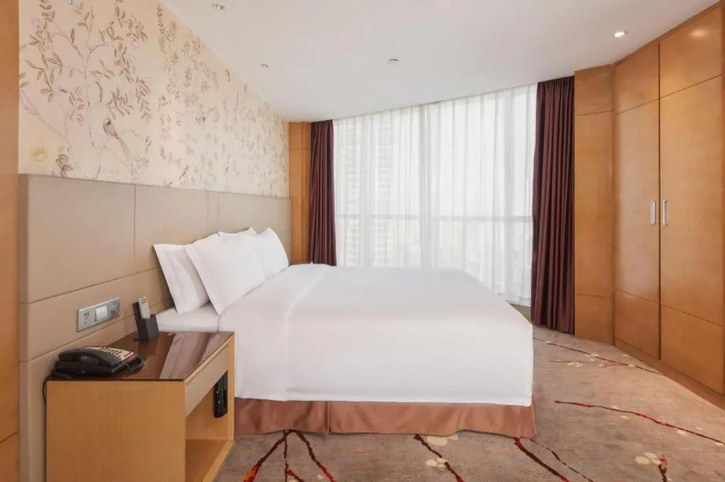 Bed in Yueyang Grand Skylight Hotel