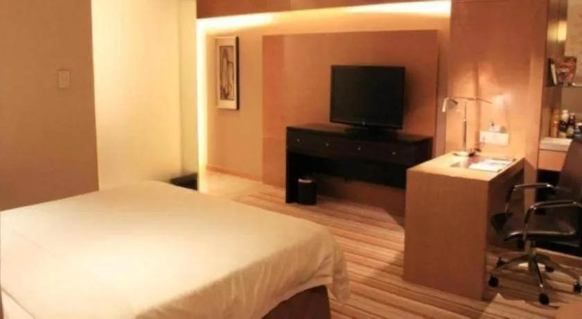 Bed in Yueyang Grand Skylight Hotel