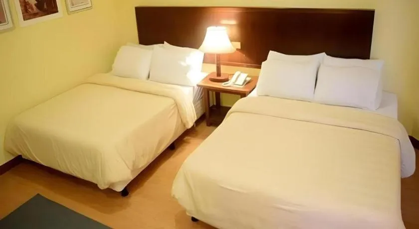 Bed in Subic Park Hotel