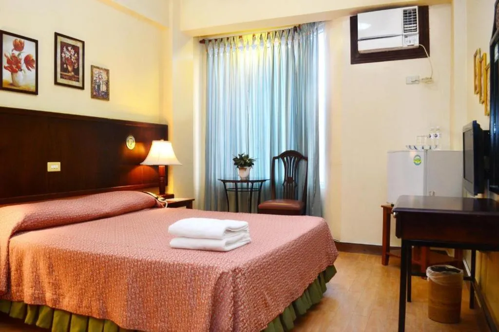 Bed in Subic Park Hotel