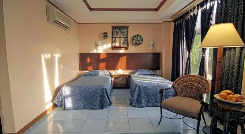 Bed in Subic Park Hotel