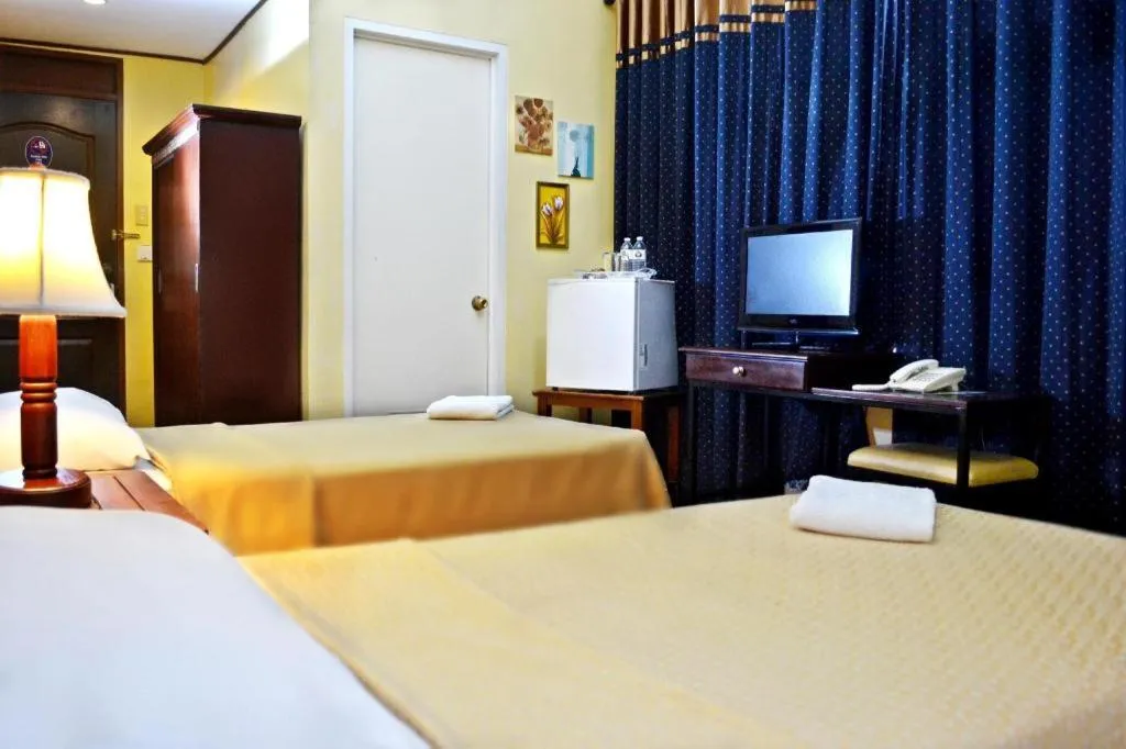 Bed in Subic Park Hotel