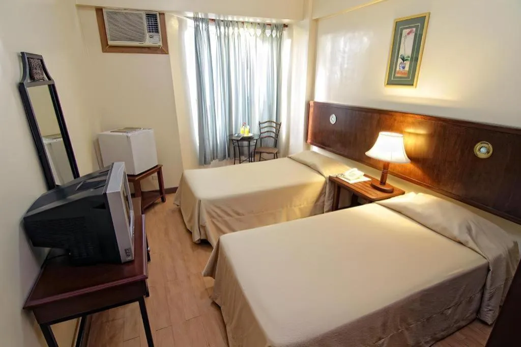 Bed in Subic Park Hotel