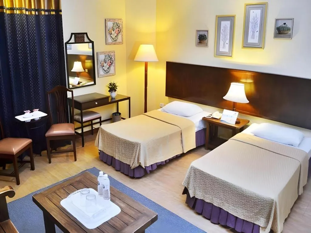 Bed in Subic Park Hotel