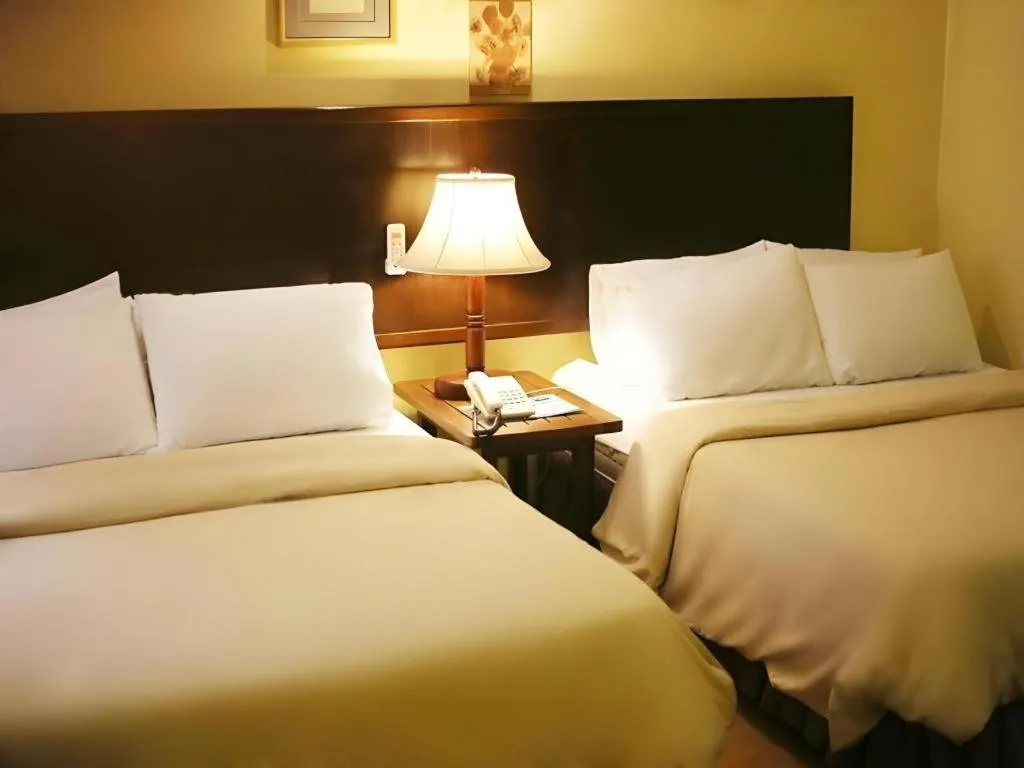 Bed in Subic Park Hotel