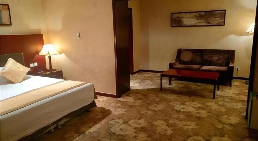 Bed in Zhong Yi Peng Ao Hotel